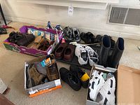 Lot of assorted men's and women's shoes, some new and some with light use, plus shoe accessories