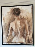 Front view of framed canvas print showing image and condition