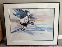Framed print showing Cliff Ronning playing ice hockey for the Vancouver Canucks