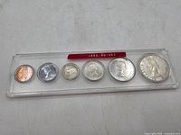 Full view of all six coins in original clear holder labeled ‘1954 BU SET’.