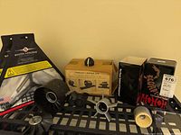 Overview of lot with Scorpion motor boxes, Turb-Ax 1 ducted fan box, fan components, and Master Airscrew propellers in original sealed packaging.