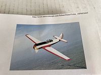 Printed instruction sheet showing color photo and technical specs