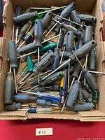 Box filled with various Mastercraft and other brand screwdrivers with T-handles and standard grips