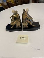 Side view showing swivel heads, condition revealing wear and possible repairs.