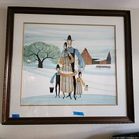 Full view of framed wall art showing Amish family with snow scene and barn.