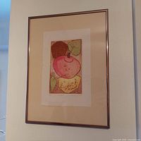 Framed original artwork shown hanging on a wall, overall view of frame, mat, and artwork.