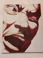 Close-up front view of the original acrylic painting showing intense emotional facial expression with red and cream shades.