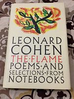 Cover of the hardcover book showing title and abstract colorful tree illustration.