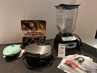 Complete set of blender, waffle maker, griddle, recipe book and manuals