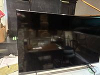 Front view of 50″ TV showing screen and bezel