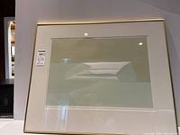 Full view of the framed artwork showing mat, frame and overall condition