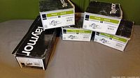 Boxes containing Taymor Passage commercial door locks with visible branding and model info.