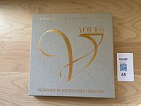 Beige box cover with gold embossed large 'VOICES' text and subtitle, presented by Joachim-Ernst Berendt.