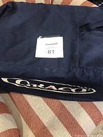 Carrying bag with Graco branding, shows the color and condition of the bag.