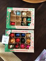 Two boxes of assorted vintage glass Christmas tree ornaments in cardboard boxes labeled Christmas Tree Ornaments