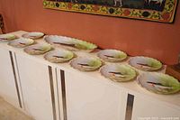 Server and 10 plates arranged on cabinet