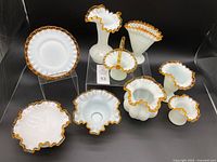 Full lot of 9 Fenton Amber Gold Crest glassware items arranged and clearly visible.