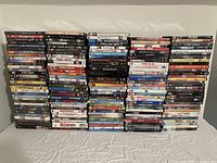 Front view of all stacked DVDs and Blu Rays showing full lot contents