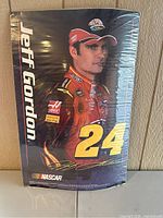 Front of the Jeff Gordon NASCAR poster showing the image of Jeff Gordon, his number 24, and branding.
