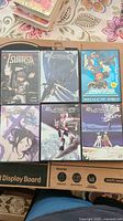 Top view of 6 anime DVD cases showing Eureka Seven, Tsubasa, and Sky Coper titles.