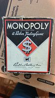 Closed vintage Monopoly game box featuring Parker Brothers branding