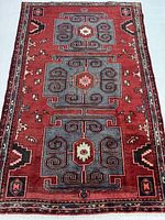 Full view of rug showing overall geometric medallion design and color scheme