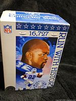 Closed box with image of Emmitt Smith and limited edition number 16,727 out of 17,279
