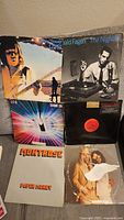 Photo of seven vinyl record covers including Donald Fagen - The Nightfly, Montrose - Paper Money, and other vintage albums.