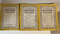 Three yellow-bordered National Geographic magazine covers from 1940, front view