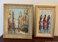 Both paintings together showing street scene on the left and abstract on the right, both in decorative frames.
