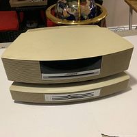 Front view of stacked Wave Music System over multi-CD changer