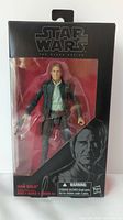 Full front photo of original sealed Star Wars Black Series Han Solo figure box showing figure inside packaging, box is black with Star Wars branding and an illustrated image of Han Solo on the front bottom corner.