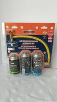 Front of Emzone A/C deluxe recharge and sealant kit packaging with three canisters in front.