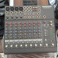 Full top view of the Mackie 1202-VLZ mixer showing all input/output jacks, knobs, and LED meters.