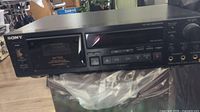 Front view of Sony RX77ES cassette deck showing overall condition and placement.