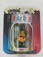 Full front view of Star Trek Mini Mates Gorn figure sealed in original plastic blister pack and cardboard backing.