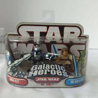 Front view of unopened Star Wars Galactic Heroes packaging containing Jango Fett and Obi-Wan Kenobi figures.