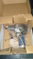 Mastercraft impact wrench in original box, wrapped in plastic, including oil container and air fitting.