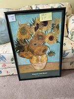 Framed print of Vincent van Gogh's Sunflowers with visible detail and colors, 25" x 31" measurement shown on sticky note.