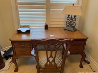 Front view of desk and chair, showing overall style and layout