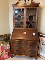 Full front view of closed desk and bookcase