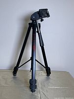 Full view of the Blacks BX45 tripod set on a flat surface showing adjustable legs, handle, and mounting head.