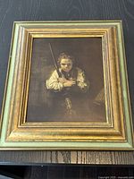 Front view of framed print showing Girl with Broom, details the image and frame condition.
