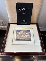 Framed "Summer Day" print with seller's lot number card on top.