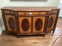 Full front view of the Ethan Allen Easton mahogany sideboard showing the decorative marquetry veneer and hardware.