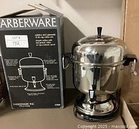 Photo of Farberware coffee urn next to original packaging box showing lot number and product details.