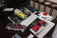 Overview of six die cast car models on tabletop