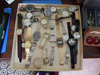 Tray showing all watches installed in single layer for overview