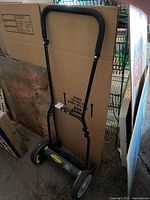 Full photo of Yardworks manual push reel lawn mower showing handlebar and reel.