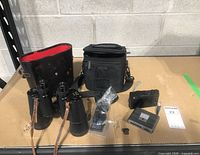 Overview of binoculars, cases, camera and accessories